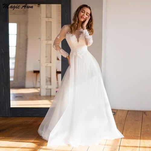 Magic Awn Bohemian Wedding Dresses 2021 Long Sleeves Lace Appliques Princess Beach A-Line Bridal Gowns Illusion Robe De Mariage
