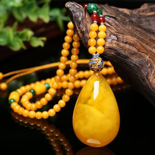 Wax water drop pendant Baltic gold twisted honey original stone pendant womens versatile sweater chain amber necklace