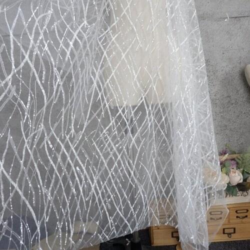 LASUI 3 yards=1 piece heavy work sequins embroidered white mesh lace fabric DIY wedding dress skirt garment fabric X0583