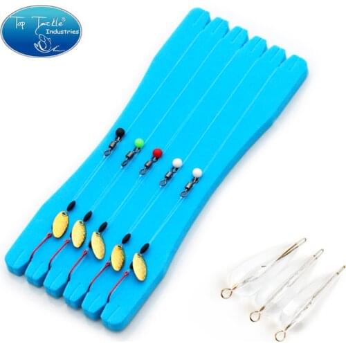 Combination fishing group for arctic catfish and salmon made up of 5 sets of string fly hooks and spinner spoon with 3 throwers