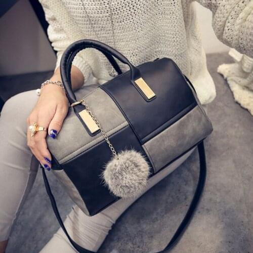 Womens 2021 European and American fashion stitching hand-held middle bag single shoulder slanting color contrast styling bag