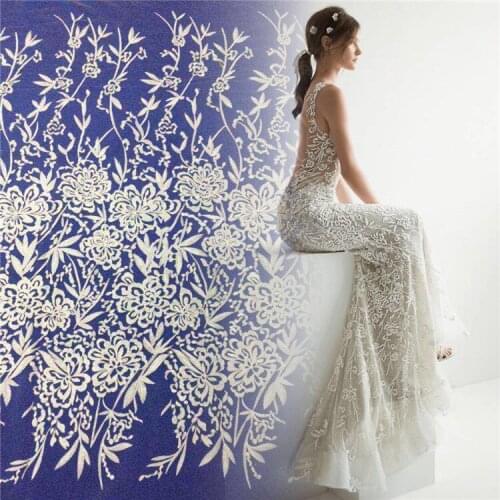High fine workmanship tulle mesh embroidered bright off white wedding lace fabric bridal gown lace materail