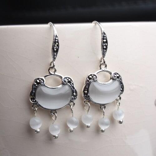 KJJEAXCMY fine jewelry S925 Pure silver jade medullary long life lock earrings white female eardrop retro earring earrings fashi