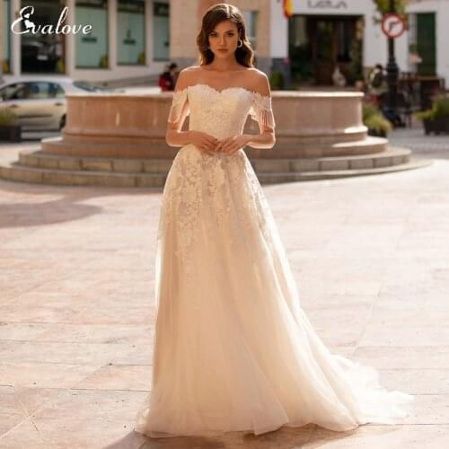 EVALOVE Romantic Sweetheart Neck Lace Up Bride A-Line Wedding Dresses Luxury Beading Appliques Customized Bohemian Wedding Gown