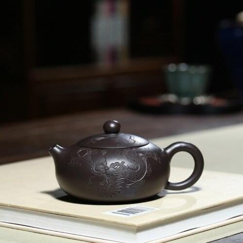 Yixing are recommended by Xia Tao all hand black clay figurine Long Bian xi shi ceramic tea-pot travel tea set gift