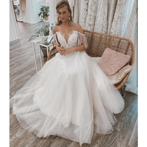 Wedding Dress A-Line 2021 Sweetheart Backless Short Sleeve Bridal Gowns Robe De Mariee Lace Appliques White Elegant Tulle Grace
