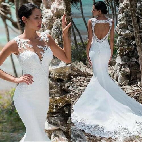 2020 Bohemian Wedding Dresses Jewel Appliqued Lace Sequins Boho Bridal Dress Hollow Back Sweep Train Wedding Gowns