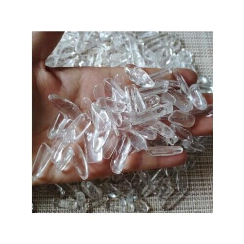 Wholesale natural polished clear white small crystal strip tumbled stone healing for sale