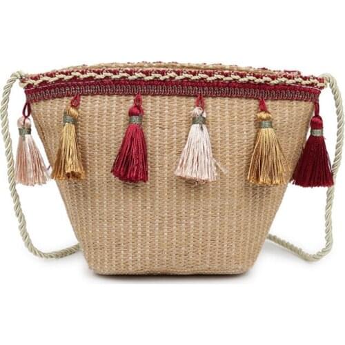 Straw beach bag 2021 new shoulder bag womens small bag vacation leisure knitted tassel bucket bag coin purse