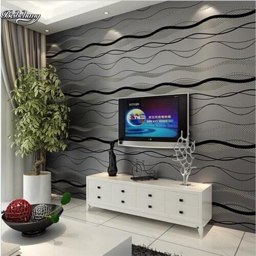 Beibehang Modern simple wave striped non - woven wallpaper 3d flocking pearl living room bedroom background wallpaper