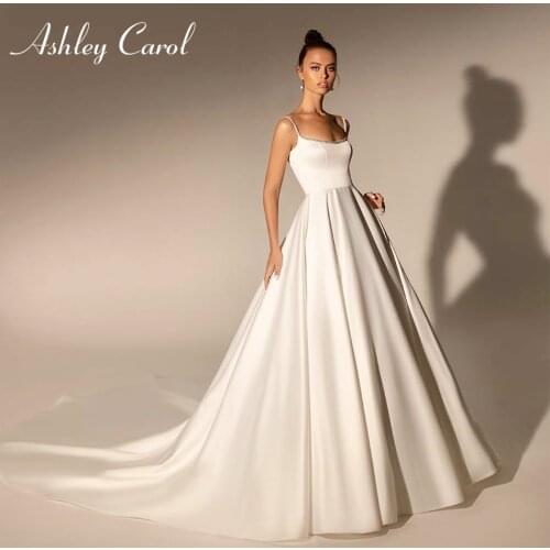 Ashley Carol A-Line Wedding Dress 2021 Dreamy Beaded Spaghetti Straps Bride Satin Sweetheart Backless Princess Bridal Gown