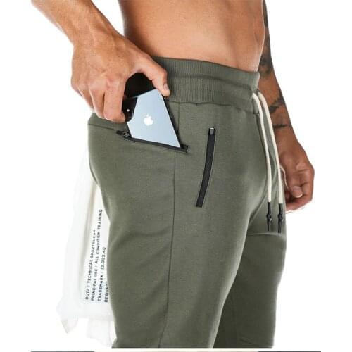 2021 Sports Men Gyms Pants Joggers Fitness pure color Long Pants Men Workout Skinny Sweatpants Jogger Running men Trousers 3XL