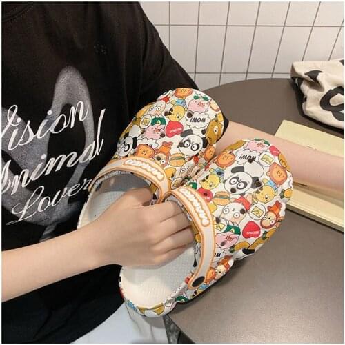 Sandals and slippers female summer outing INS cute cartoon non-slip thick-soled girl heart Baotou beach hole shoes