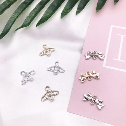 10pcs / pack Kawaii Bow Hanger DIY Jewelry Decorative Pearl Fresh Pendant Accessories Cute Connector Metal Bow YZ202