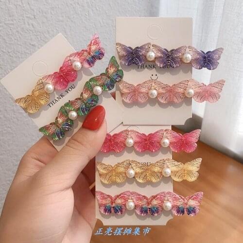 2020 new Korean style temperament super Fairy sweet Mori fairy pearl butterfly hair clip out girl heart one word clip edge clip