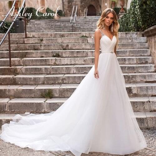 Ashley Carol A-Line Wedding Dress 2021 Spaghetti Straps Elegant Backless Crystal V-neck Beach Tulle Bridal Gown Vestido De Noiva