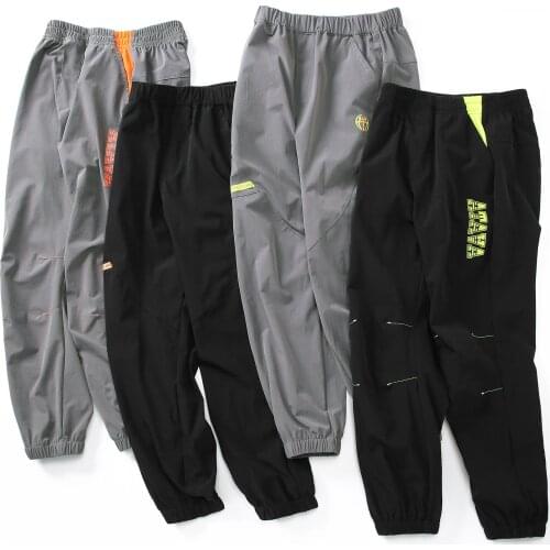 Kids clothes summer quick-drying pants boys girls sweatpants youth light and thin styles big kids mouth-up anti-mosquito pants