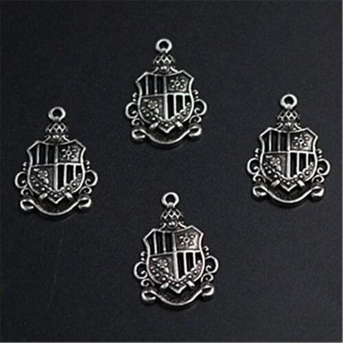 WKOUD 10pcs Silver Plated hollow shield alloy pendant vintage necklace bracelet DIY handmade metal jewelry makings A1294