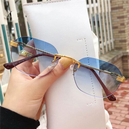 2021 Mens Fashion Gold Metal Rimless Sunglasses Retro Steampunk Womens Pilot Simple Funny Street Shooting Gradient Eyewears