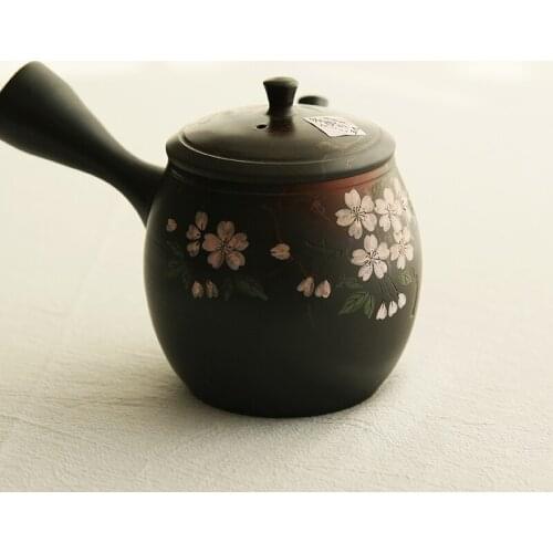 Imported from Japan slide burn mei guang long jewel light cherry blossom algal grain kiln side put the teapot lasts