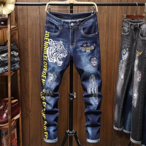 New Mens Autumn Winter Tiger Head Embroidered Jeans Personality Blue Stretch Denim Pants Classic Motorcycle Hip Hop Trousers