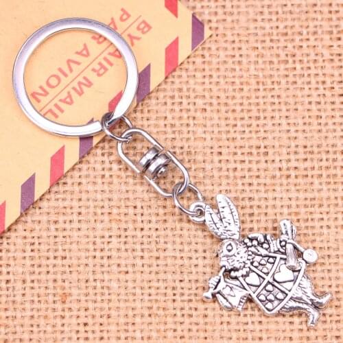 New Fashion Keychain 36*23 mm musical rabbit trumpet Pendants DIY Men Jewelry Car Key Chain Ring Holder Souvenir For Gift