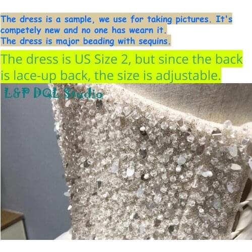 Sample US Size 2 Wedding Dress competely new dress but we use for sample and take pictures