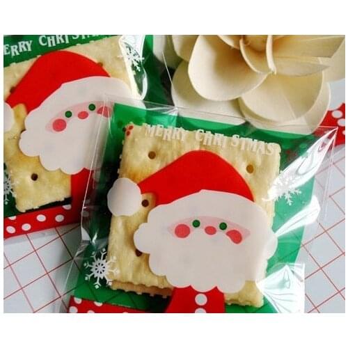 100pcs Gift Plastic Bag Christmas Santa Claus Father Christmas Cellophane Bag Cute Cookies Biscuit Cake Plastic Party Cake Bag