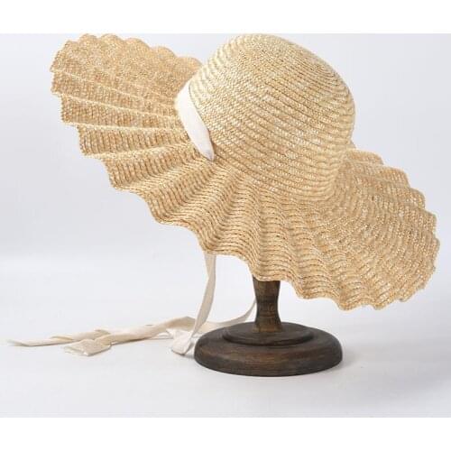 2021 INS Fashion Women Straw Sun Hats Party Wave Wide Eaves Brim Hat Ladie Ribbon Hats White Holiday Beach Hat Wholesale Gorros