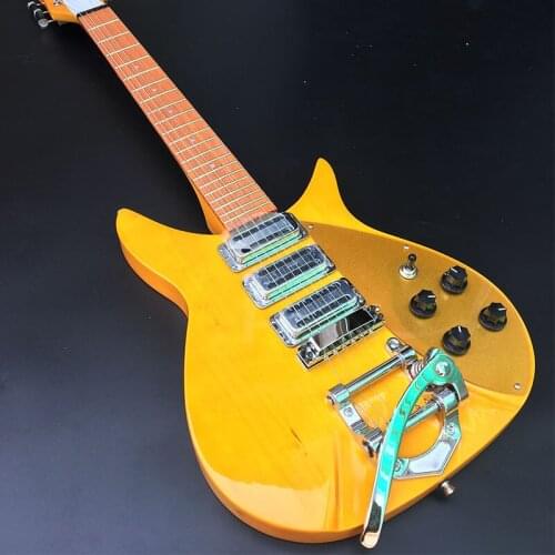 High-quality 325 electric guitar has varnish on its fingerboard, light yellow paint, 527mm bridge to nut, small double-rocking g