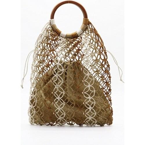 Hand woven Hollow wood straw handle New Woven bag woman beach bag 2019 new fashion