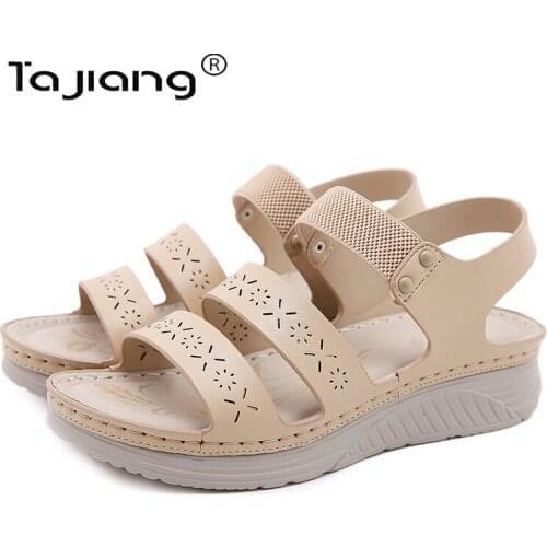 Ta Jiang New thick-soled wedge sandals European and American fashion hollow summer female gladiator beach slippers T0881-2
