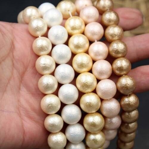 Hot Sales Good quality Imitation of Japanese cotton pearl beads straight hole grain shell beads DIY jewelry beads material