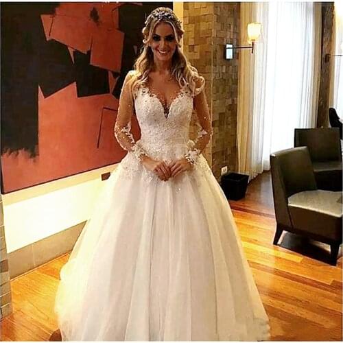 White Tulle Wedding Dresses A Line Appliqued Lace Beads Illusion Long Sleeve Sexy Back Buttons V-neck Women Country Bridal Gowns