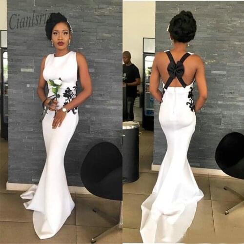 2020 White Mermaid Prom Dresses Lace Appliques Sexy Backless Woth Bow Evening Party Gowns