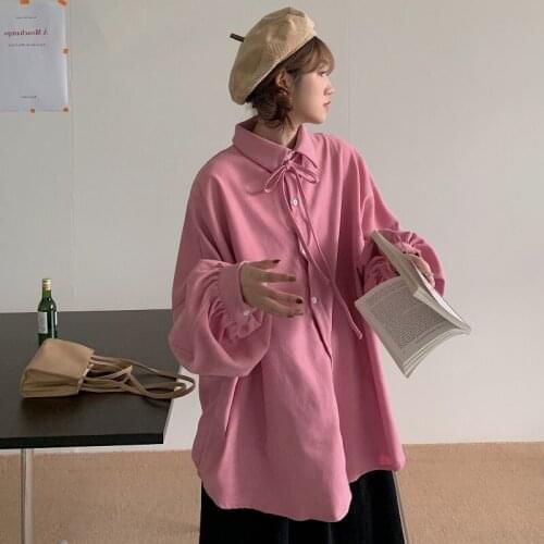 Pink long-sleeved shirt womens 2021 spring and autumn new Korean version of loose student design shirt in the long top trend