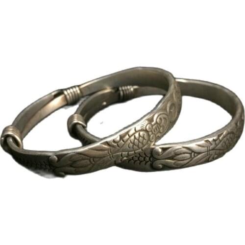 Collection of silver Pisces bracelets handmade in Tibet