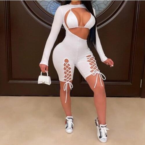 BKLD Fashion High Street Bandage Bodycon Jumpsuit Asymmetric Solid Long Sleeve Hollow Out Lace-up Backless Rompers Sexy Playsuit