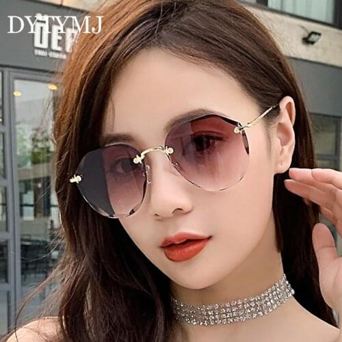 DYTYMJ Rimless Retro Sunglasses for Women Designer Sunglasses Luxury Brand Eyeglasses Women Mirror Gafas De Sol Mujer 2020