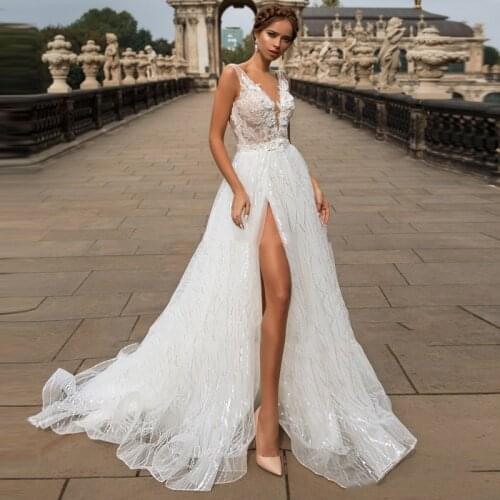 Charming Sparkling A Line Wedding Dresses Sleeveless V Neck High Slit Lace Appliques Lace Appliques Bride Dress Backless