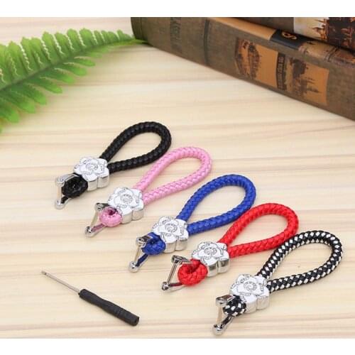 Hand-braided rope key chain alloy flower skin rope key chain candy color PU braid key chain
