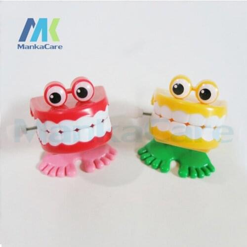 20 Pcs Childrens toys on the chain / chain jumping tooth / strange new toy /cute playful childrens plastic toys Dental gifts