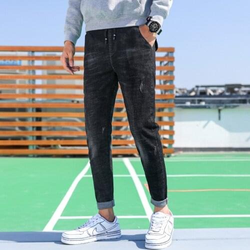 2021 Spring New Lace Up Elastic Waist Mens Jeans Japanese Fashion Teenagers Harem Pants Mens Small Leg Jeans