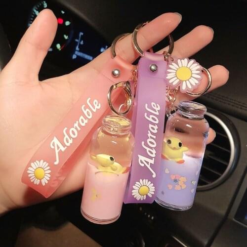 New Cute Little Duck Keychain Cylindrical Liquid Floating Keyring Women Couple Car Backpack Pendant Key Chains Gift