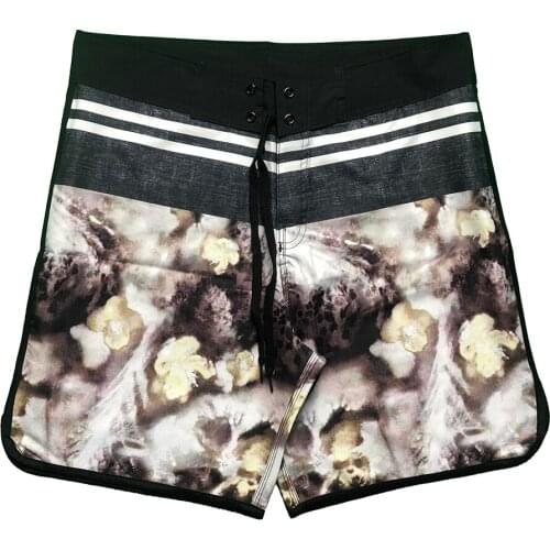 Mens fitness flower shorts casual shorts hot sale of the new four - side stretch quick dry strip hot spring surfing printed bea