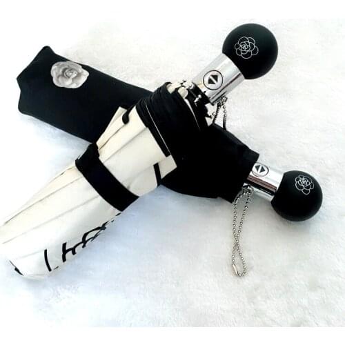 Automatic Simple Small Fragrant Black Glue Sunscreen and Anti-ultraviolet Sun Umbrella Three-fold Umbrella Dual-use Umbrella