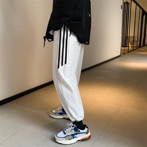 Autumn and winter new Japanese loose casual bar strips wild drawstring pants pants mens trend sports pants
