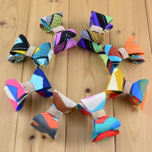 64pcs/lot 3.2'' Solid 3D bowknot no clip magic Super Hard PVC Satin Bow with rhinestone button For Girls Hair Accessories HDJ41