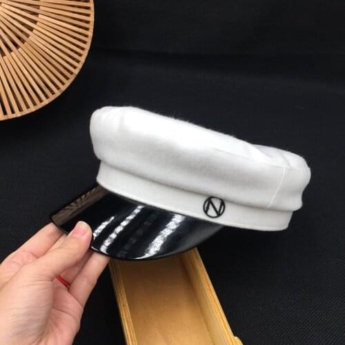 About the new wool cap fashion street joker navy hat white leather cap students leisure visors sailor cap
