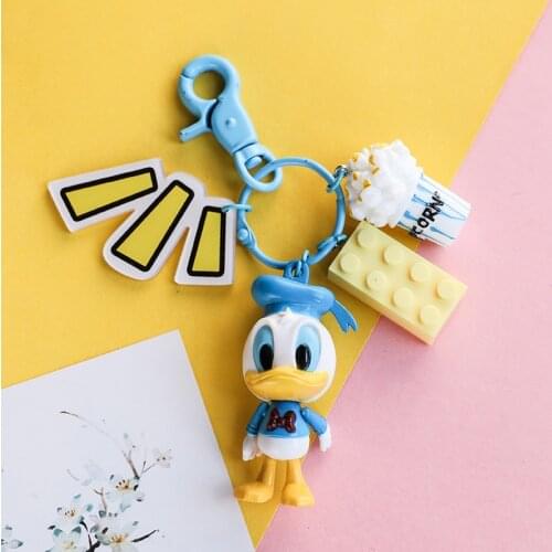 Hot Disney Mickey Mouse Minnie Woody Buzz Lightyear Stitch Action Figure Keychain Donald Duck Daisy Figure Doll Women Keyring